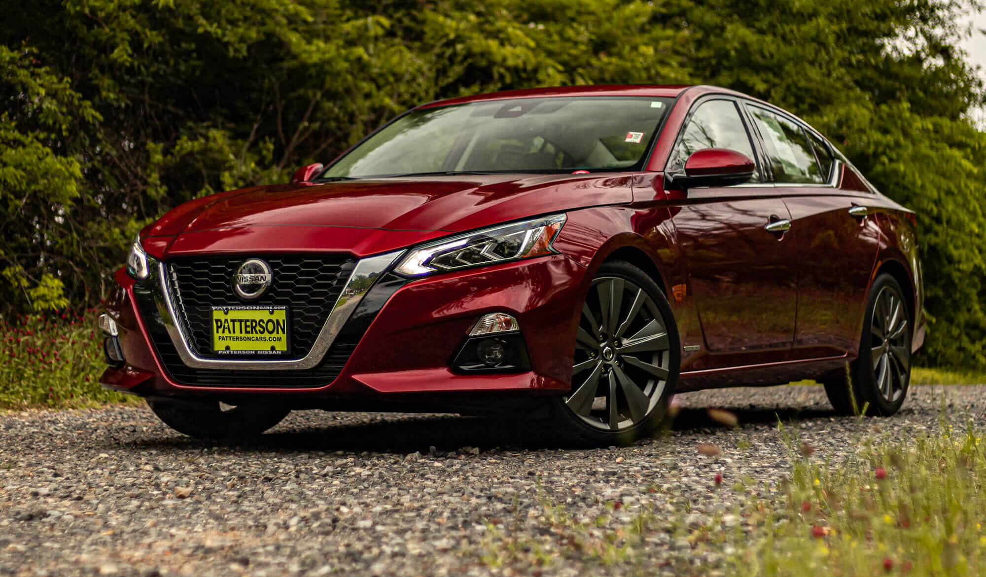 red nissan sedan